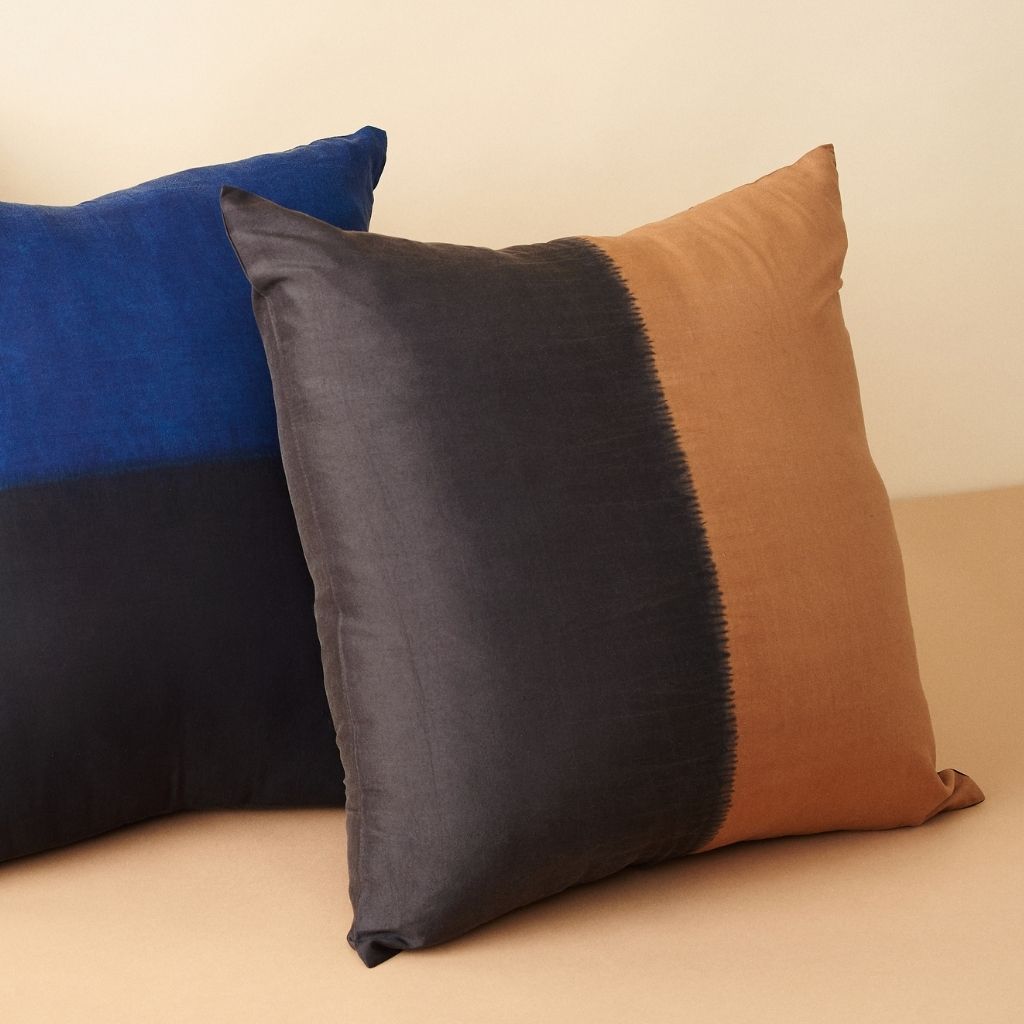 Kala Black & Gold Color Block Mulberry Silk Square Pillow showcasing luxurious silk texture.