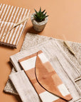 Oak Brown Zero Waste Handmade Artisanal Journal surrounded by natural textures and a small succulent plant.