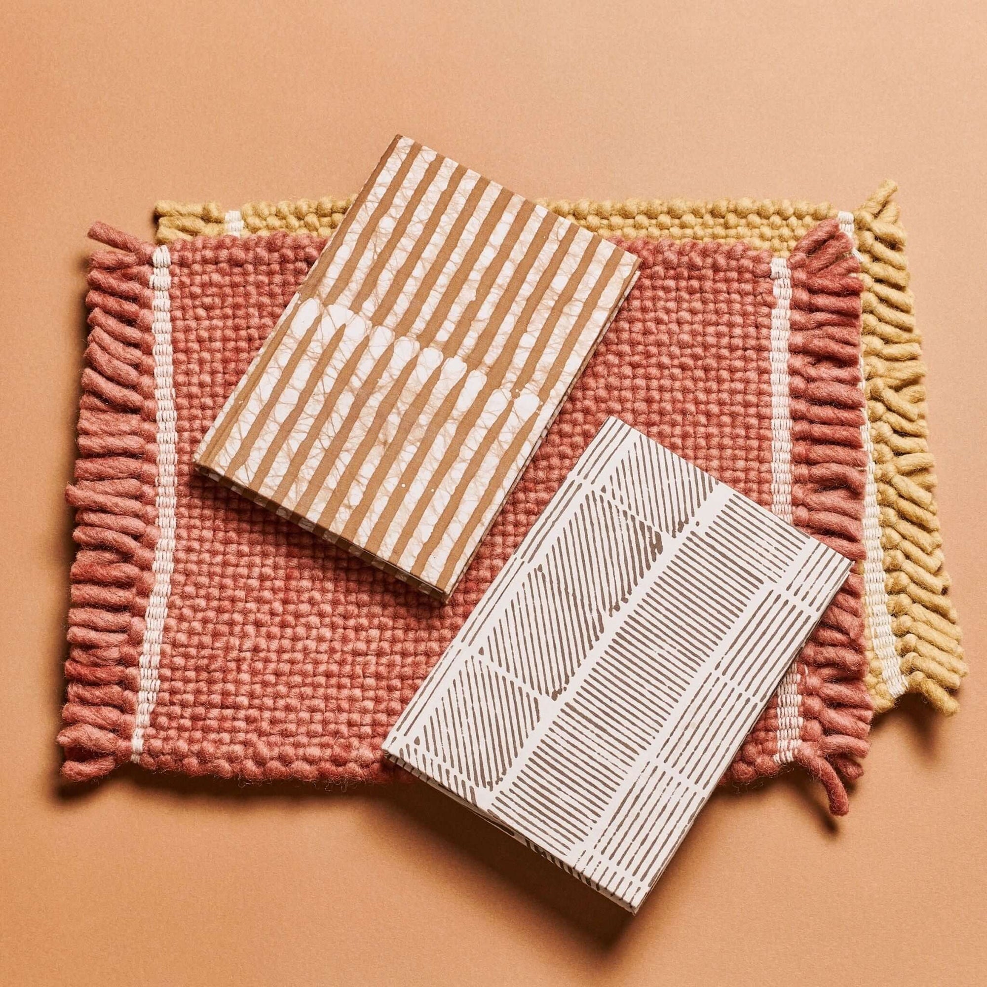 Bistre Black Zero Waste Handmade Artisanal Journal displayed on a textured mat with woven borders.