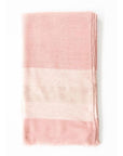 Rosa Plush Maroon Plush Merino Queen Bedspread / Large Throw draped on a surface showcasing its soft pink hues and luxurious texture.