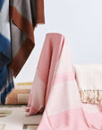 Rosa Plush Maroon Plush Merino Queen Bedspread / Large Throw displayed elegantly with herringbone design and fringe accents.