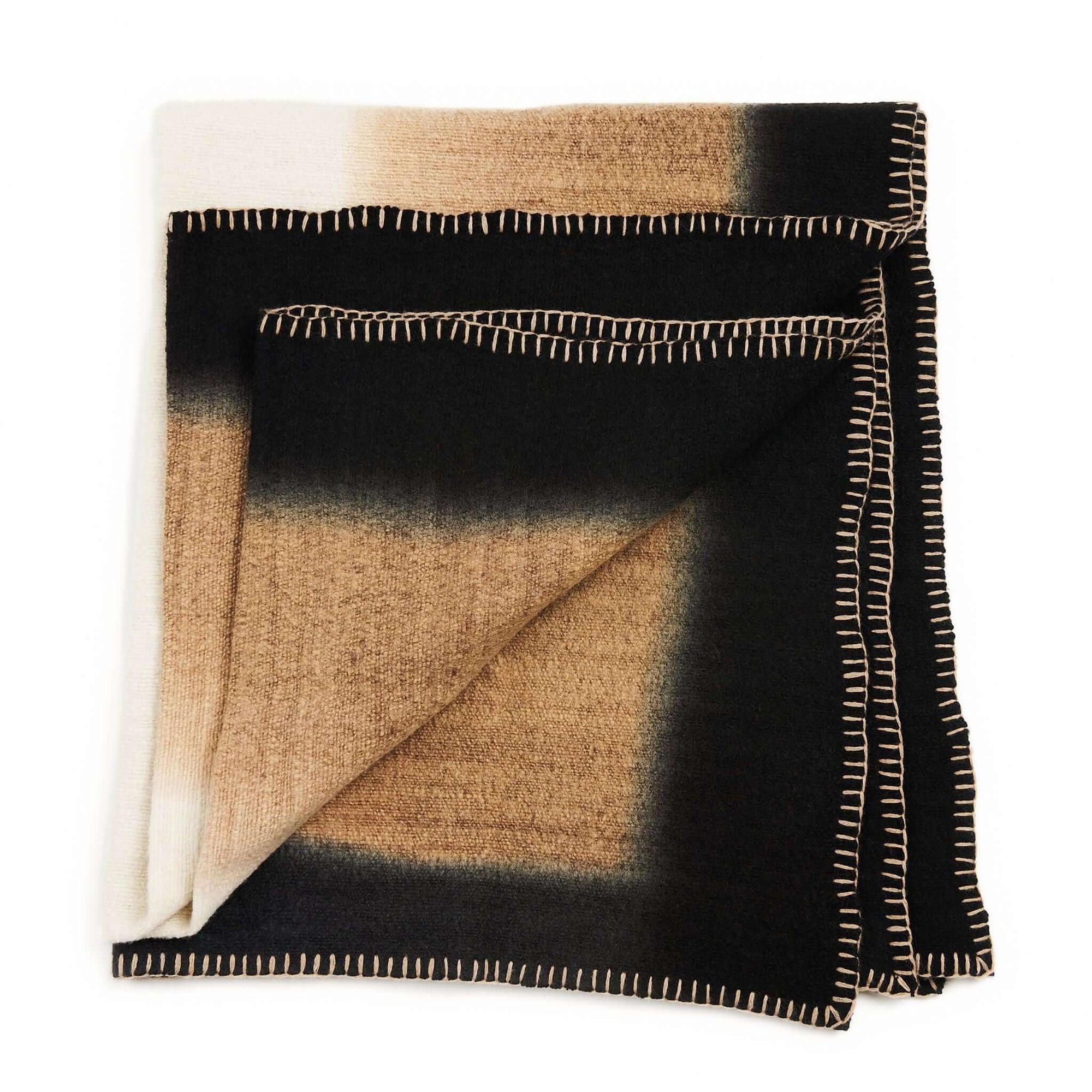 Siro Brown Handwoven Merino Artisan Throw Blanket folded, showcasing soft textures and elegant color contrast.