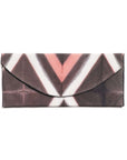 Tisa Artisanal Pouch In Black Pink Triangle Print featuring a unique triangular design in pink and black.