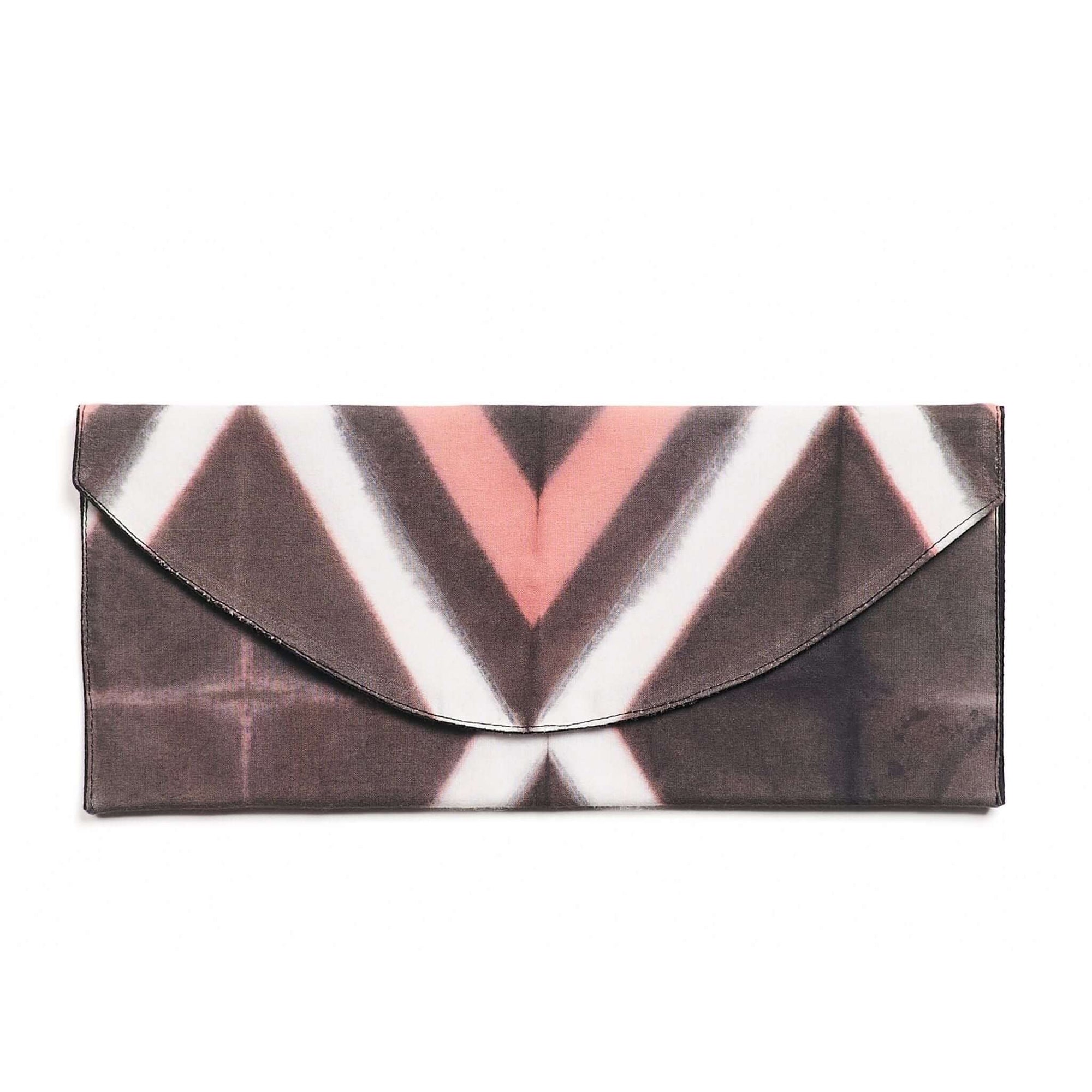 Tisa Artisanal Pouch In Black Pink Triangle Print with geometric pattern in shades of black and pink.