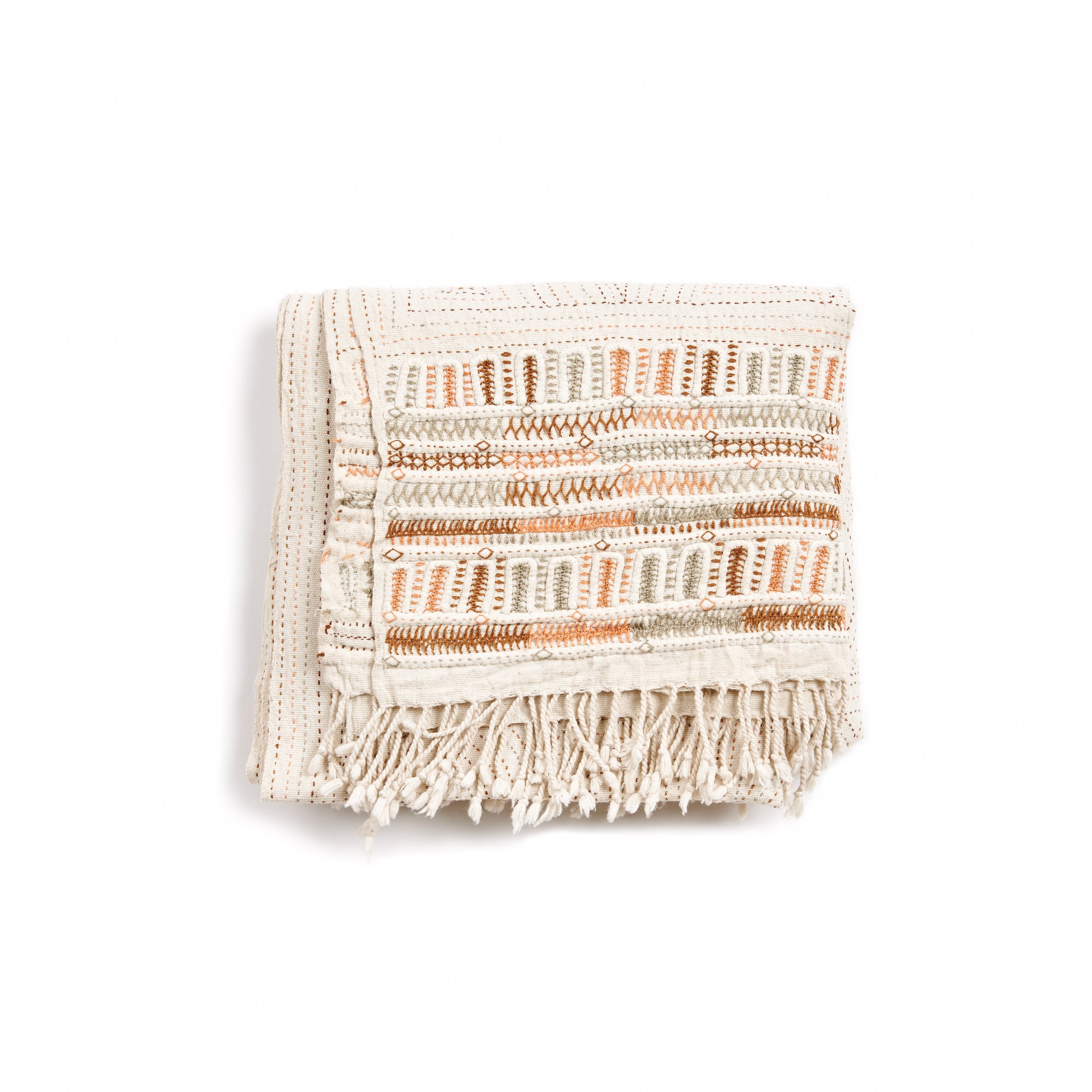Unah Coral Hand Embroidered Handwoven Cotton Artisan Throw folded with colorful embroidered borders and fringes.